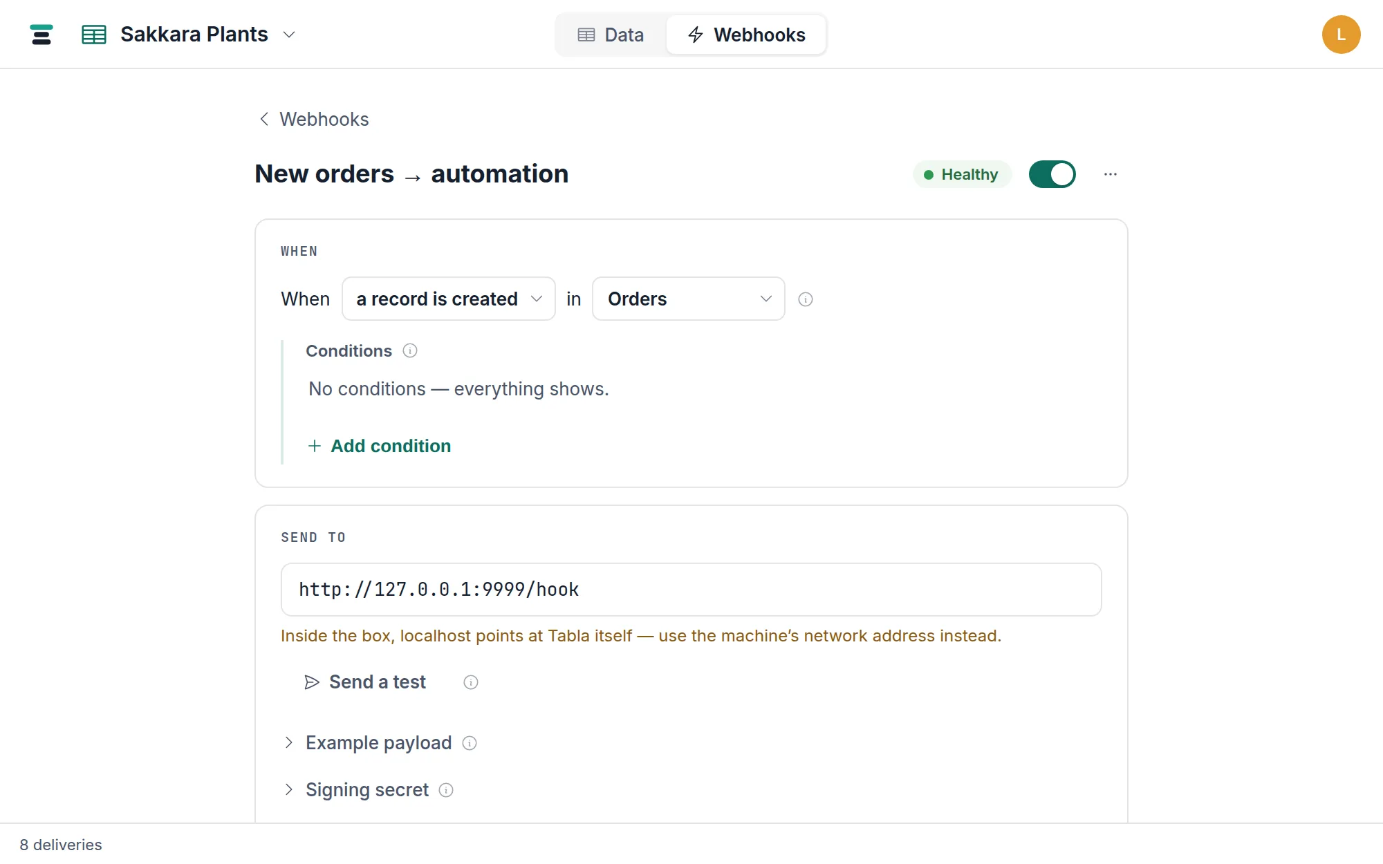 A webhook's page: the When card reading "When a record is created in Orders", the Send to card with the destination URL and Send a test, and the Deliveries ledger below.